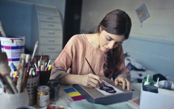 Woman in Brown Scoop-neck Long-sleeved Blouse Painting